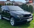 Чорний БМВ Х5, об'ємом двигуна 3 л та пробігом 390 тис. км за 12199 $, фото 1 на Automoto.ua