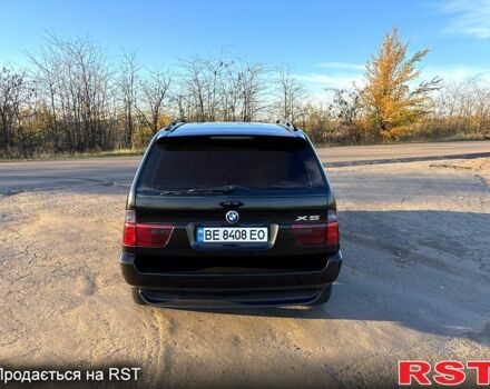 Черный БМВ Х5, объемом двигателя 3 л и пробегом 360 тыс. км за 12750 $, фото 4 на Automoto.ua