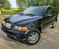 Черный БМВ Х5, объемом двигателя 3 л и пробегом 230 тыс. км за 3117 $, фото 1 на Automoto.ua