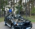 Черный БМВ Х5, объемом двигателя 2.99 л и пробегом 400 тыс. км за 7500 $, фото 1 на Automoto.ua