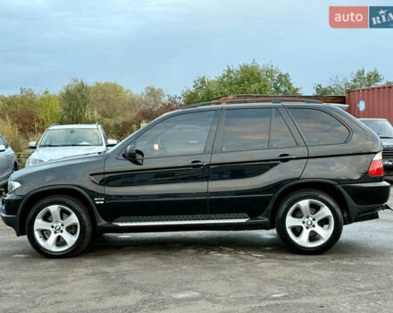 Чорний БМВ Х5, об'ємом двигуна 3 л та пробігом 447 тис. км за 11999 $, фото 28 на Automoto.ua