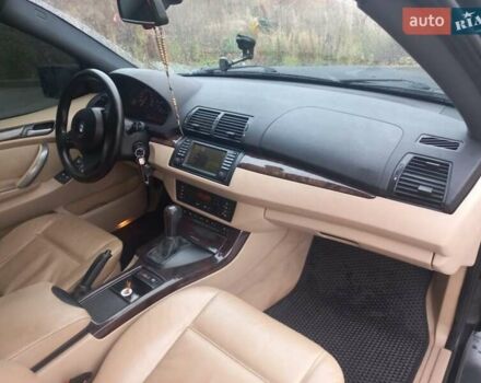 Черный БМВ Х5, объемом двигателя 3 л и пробегом 331 тыс. км за 12500 $, фото 24 на Automoto.ua