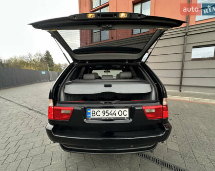 Чорний БМВ Х5, об'ємом двигуна 3 л та пробігом 304 тис. км за 10350 $, фото 91 на Automoto.ua