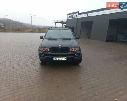 Черный БМВ Х5, объемом двигателя 3 л и пробегом 331 тыс. км за 12500 $, фото 1 на Automoto.ua
