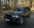 Черный БМВ Х5, объемом двигателя 3 л и пробегом 380 тыс. км за 11200 $, фото 1 на Automoto.ua