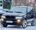 Чорний БМВ Х5, об'ємом двигуна 3 л та пробігом 447 тис. км за 12499 $, фото 1 на Automoto.ua