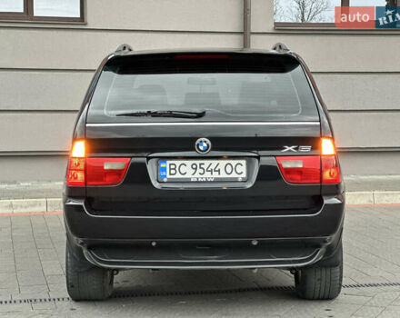 Чорний БМВ Х5, об'ємом двигуна 3 л та пробігом 304 тис. км за 10350 $, фото 23 на Automoto.ua
