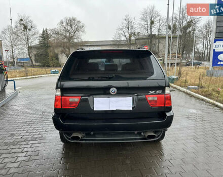 Чорний БМВ Х5, об'ємом двигуна 3 л та пробігом 320 тис. км за 5999 $, фото 4 на Automoto.ua