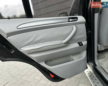 Чорний БМВ Х5, об'ємом двигуна 3 л та пробігом 304 тис. км за 10350 $, фото 77 на Automoto.ua