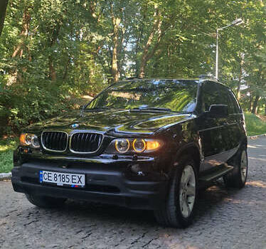 Черный БМВ Х5, объемом двигателя 4.4 л и пробегом 300 тыс. км за 9999 $, фото 3 на Automoto.ua