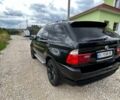 Чорний БМВ Х5, об'ємом двигуна 3 л та пробігом 326 тис. км за 14000 $, фото 1 на Automoto.ua