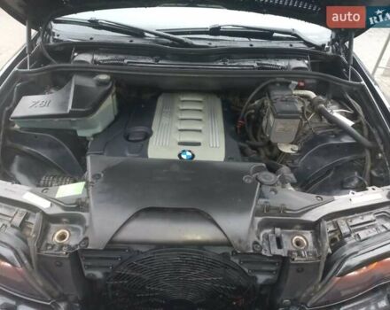 Черный БМВ Х5, объемом двигателя 3 л и пробегом 331 тыс. км за 12500 $, фото 40 на Automoto.ua