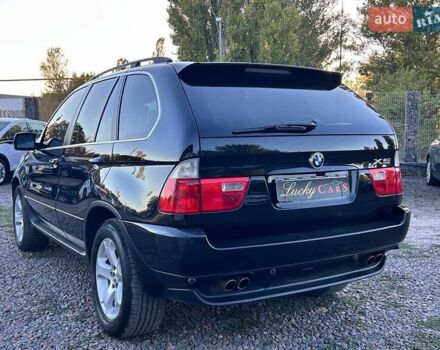 Черный БМВ Х5, объемом двигателя 4.4 л и пробегом 311 тыс. км за 9500 $, фото 6 на Automoto.ua