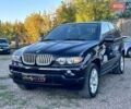 Черный БМВ Х5, объемом двигателя 4.4 л и пробегом 311 тыс. км за 9500 $, фото 1 на Automoto.ua