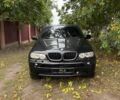 Черный БМВ Х5, объемом двигателя 3 л и пробегом 325 тыс. км за 6199 $, фото 1 на Automoto.ua