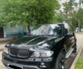 Чорний БМВ Х5, об'ємом двигуна 3 л та пробігом 371 тис. км за 10500 $, фото 1 на Automoto.ua