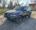 Черный БМВ Х5, объемом двигателя 4.4 л и пробегом 294 тыс. км за 8500 $, фото 1 на Automoto.ua