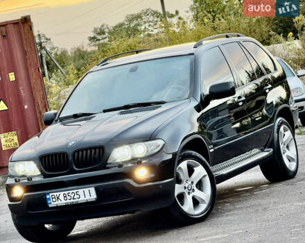 Чорний БМВ Х5, об'ємом двигуна 3 л та пробігом 447 тис. км за 11999 $, фото 5 на Automoto.ua
