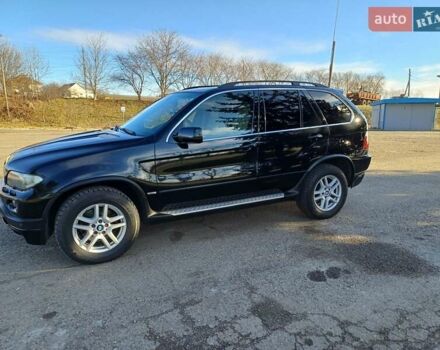 Черный БМВ Х5, объемом двигателя 3 л и пробегом 280 тыс. км за 14700 $, фото 1 на Automoto.ua