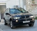 Черный БМВ Х5, объемом двигателя 3 л и пробегом 142 тыс. км за 4400 $, фото 1 на Automoto.ua