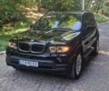 Черный БМВ Х5, объемом двигателя 4.4 л и пробегом 300 тыс. км за 10000 $, фото 1 на Automoto.ua