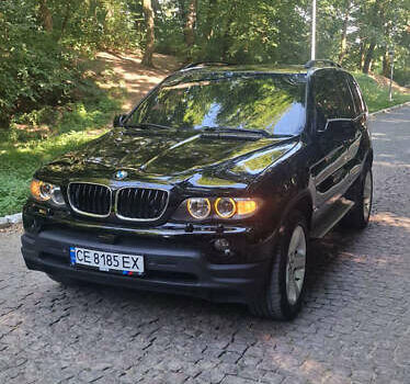 Черный БМВ Х5, объемом двигателя 4.4 л и пробегом 300 тыс. км за 9999 $, фото 4 на Automoto.ua