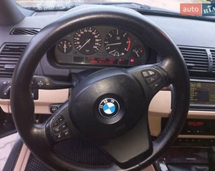 Черный БМВ Х5, объемом двигателя 3 л и пробегом 331 тыс. км за 12500 $, фото 13 на Automoto.ua