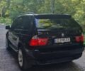 Черный БМВ Х5, объемом двигателя 4.4 л и пробегом 300 тыс. км за 10000 $, фото 3 на Automoto.ua