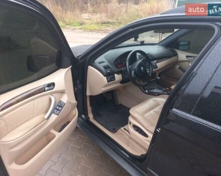 Черный БМВ Х5, объемом двигателя 3 л и пробегом 331 тыс. км за 12500 $, фото 11 на Automoto.ua