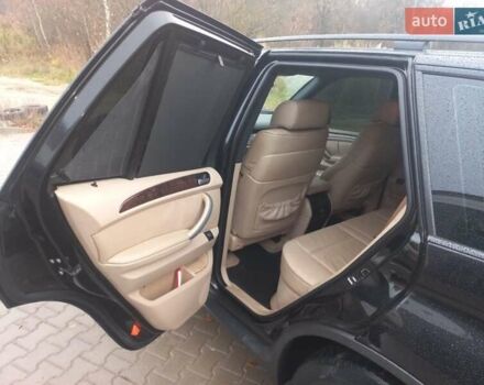 Черный БМВ Х5, объемом двигателя 3 л и пробегом 331 тыс. км за 12500 $, фото 18 на Automoto.ua