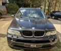 Чорний БМВ Х5, об'ємом двигуна 3 л та пробігом 325 тис. км за 6500 $, фото 1 на Automoto.ua