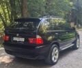 Черный БМВ Х5, объемом двигателя 4.4 л и пробегом 300 тыс. км за 10000 $, фото 4 на Automoto.ua