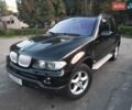 Черный БМВ Х5, объемом двигателя 3 л и пробегом 462 тыс. км за 12900 $, фото 1 на Automoto.ua