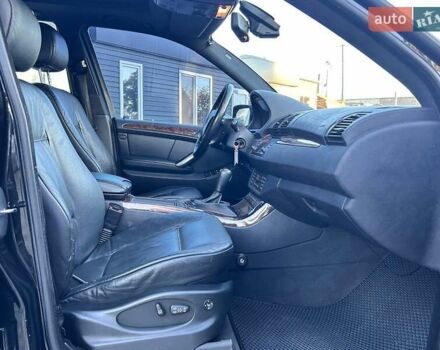 Черный БМВ Х5, объемом двигателя 4.4 л и пробегом 311 тыс. км за 9500 $, фото 33 на Automoto.ua