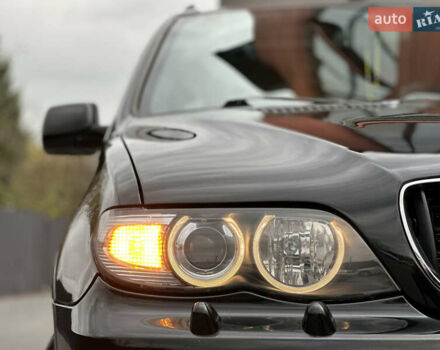 Чорний БМВ Х5, об'ємом двигуна 3 л та пробігом 304 тис. км за 10350 $, фото 4 на Automoto.ua