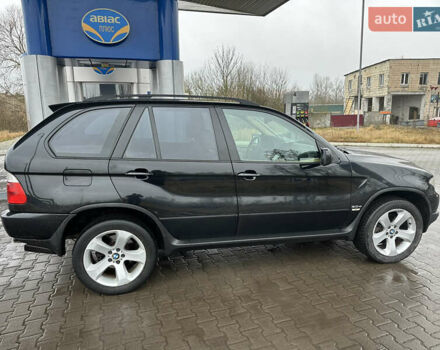 Чорний БМВ Х5, об'ємом двигуна 3 л та пробігом 320 тис. км за 5999 $, фото 6 на Automoto.ua