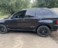 Чорний БМВ Х5, об'ємом двигуна 3 л та пробігом 294 тис. км за 8000 $, фото 2 на Automoto.ua