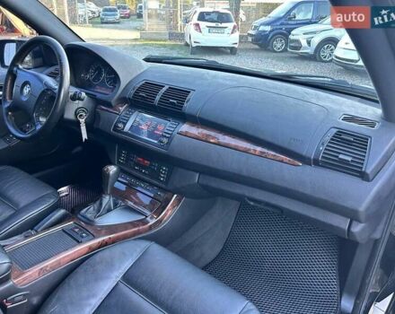 Черный БМВ Х5, объемом двигателя 4.4 л и пробегом 311 тыс. км за 9500 $, фото 36 на Automoto.ua