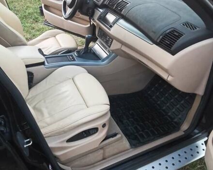 Черный БМВ Х5, объемом двигателя 3 л и пробегом 462 тыс. км за 12900 $, фото 46 на Automoto.ua