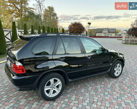 Чорний БМВ Х5, об'ємом двигуна 3 л та пробігом 290 тис. км за 11300 $, фото 25 на Automoto.ua