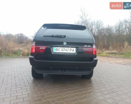 Черный БМВ Х5, объемом двигателя 3 л и пробегом 331 тыс. км за 12500 $, фото 4 на Automoto.ua
