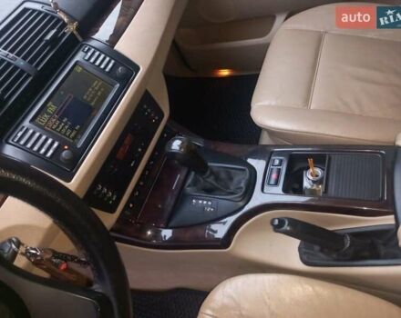 Черный БМВ Х5, объемом двигателя 3 л и пробегом 331 тыс. км за 12500 $, фото 16 на Automoto.ua