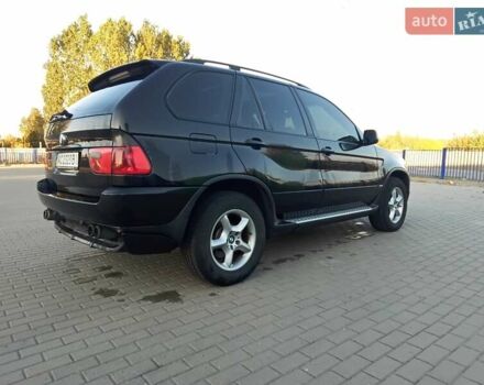 Черный БМВ Х5, объемом двигателя 3 л и пробегом 462 тыс. км за 12900 $, фото 196 на Automoto.ua