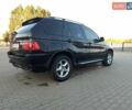 Черный БМВ Х5, объемом двигателя 3 л и пробегом 462 тыс. км за 12900 $, фото 196 на Automoto.ua