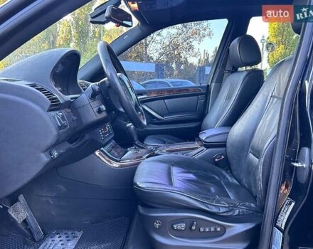 Черный БМВ Х5, объемом двигателя 4.4 л и пробегом 311 тыс. км за 9500 $, фото 12 на Automoto.ua