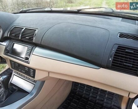 Черный БМВ Х5, объемом двигателя 3 л и пробегом 462 тыс. км за 12900 $, фото 81 на Automoto.ua