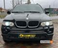 Чорний БМВ Х5, об'ємом двигуна 3 л та пробігом 340 тис. км за 11200 $, фото 1 на Automoto.ua