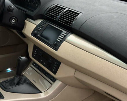 Черный БМВ Х5, объемом двигателя 3 л и пробегом 370 тыс. км за 10900 $, фото 52 на Automoto.ua