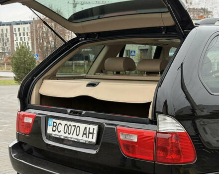 Черный БМВ Х5, объемом двигателя 3 л и пробегом 370 тыс. км за 10900 $, фото 55 на Automoto.ua