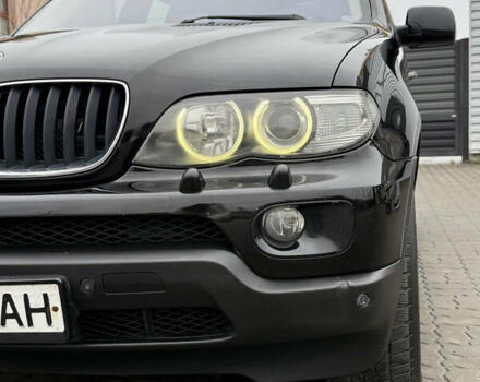 Черный БМВ Х5, объемом двигателя 3 л и пробегом 370 тыс. км за 10900 $, фото 24 на Automoto.ua